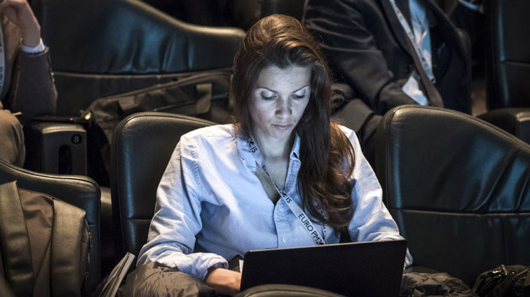 Delegate work on laptop